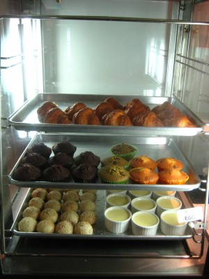 a trays of pastries and cupcakes