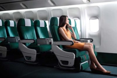 a woman sitting in an airplane
