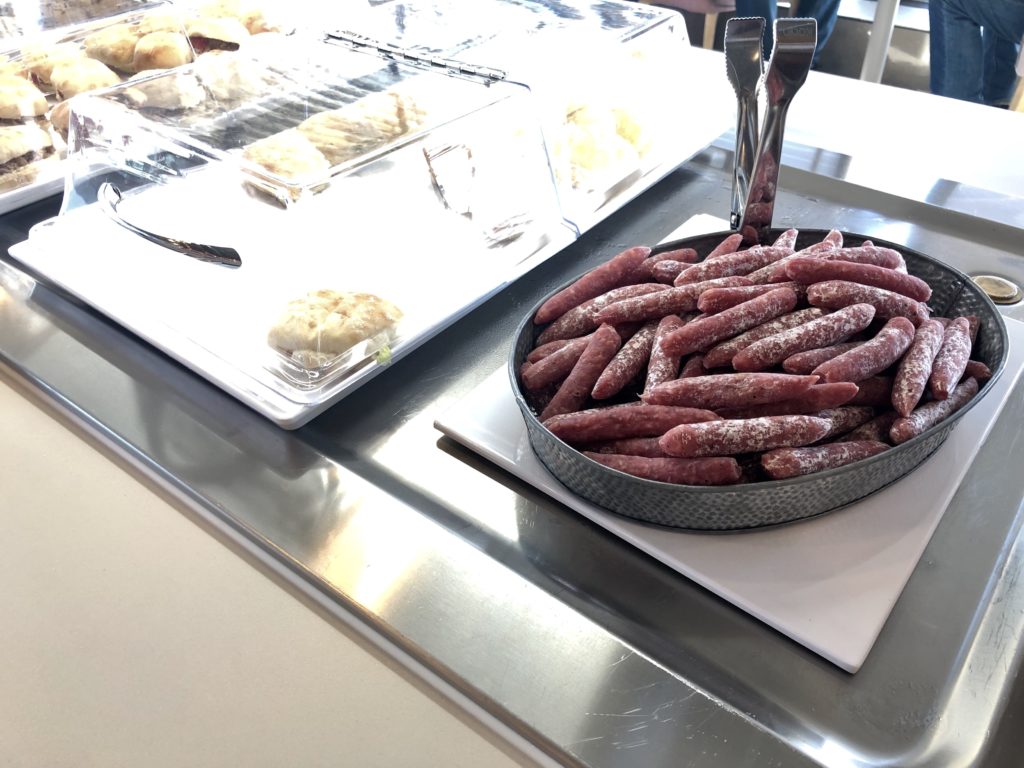 a tray of sausages on a counter