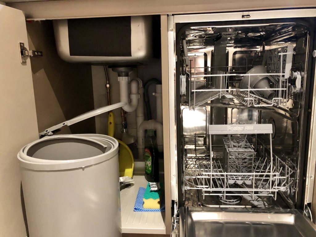 a dishwasher with a bucket and a bucket