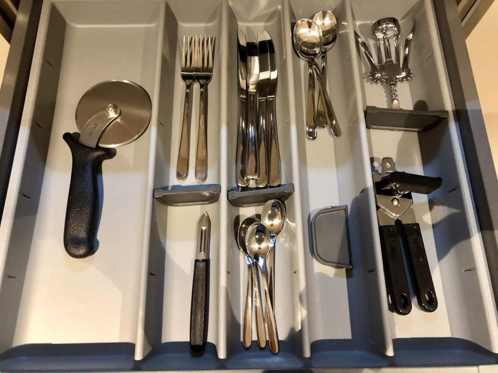 a drawer full of silverware