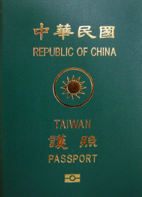 close-up of a passport with a sun and text